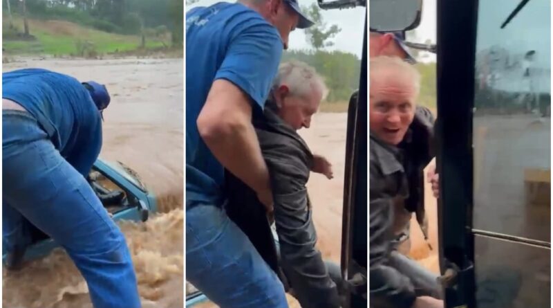 Idoso resgatado de carro na enchente - RS